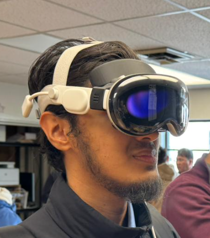 Nasif Zaman wearing a vision pro headset